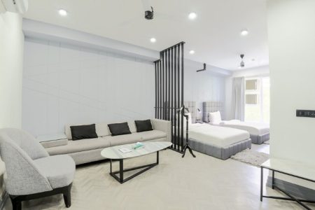 Wide angle view of Living Room, twin bed apartment, service apartment in gurgaon