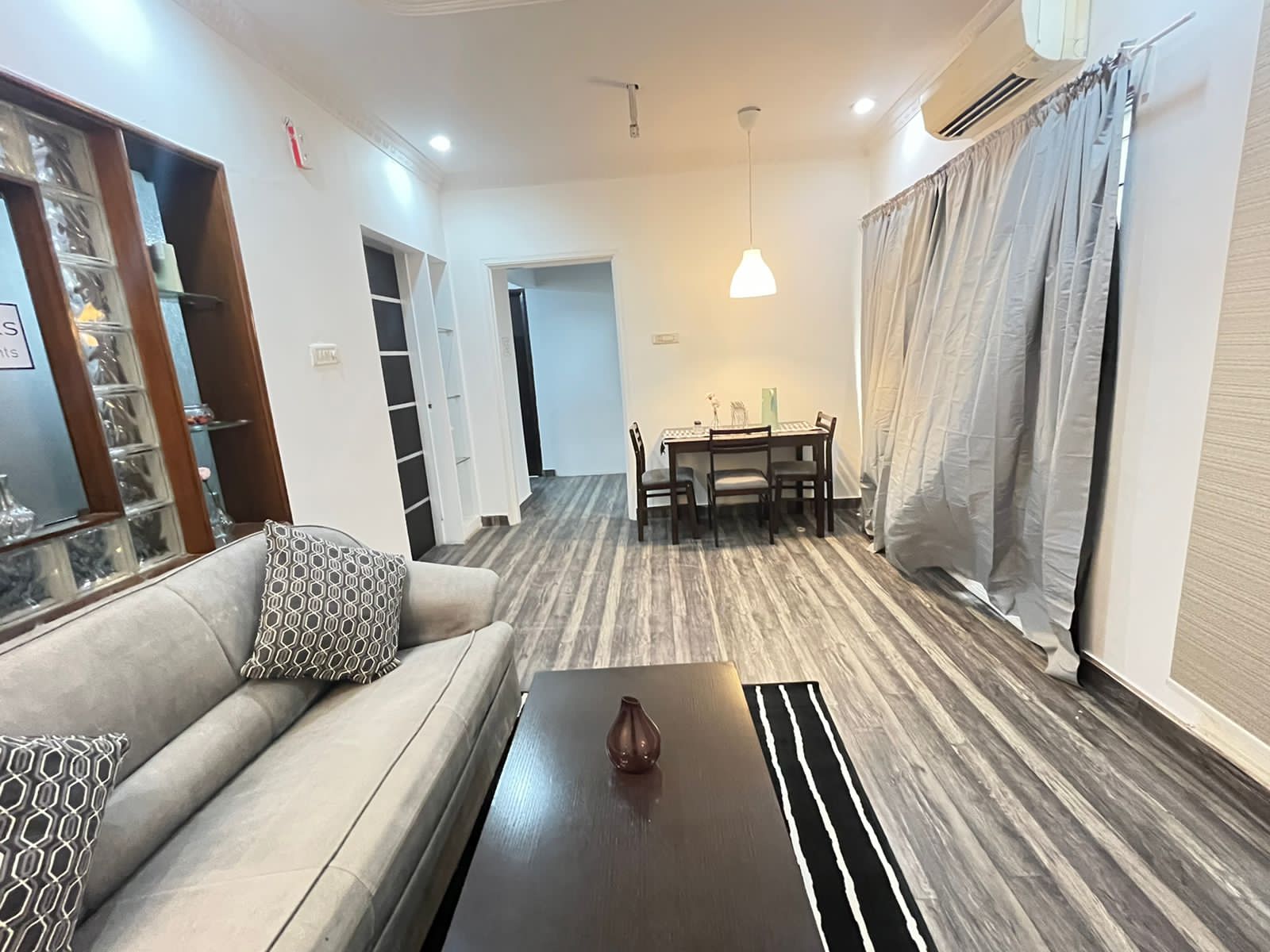 wide view of sofa, 1 bhk service apartment in hyderbad