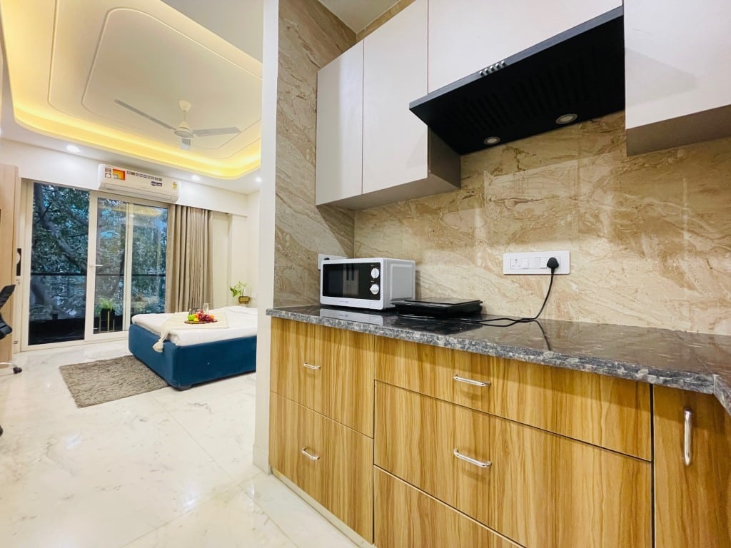 Bedchambers Serviced Apartments, DLF Cybercity Gurgaon kitchen and bedroom